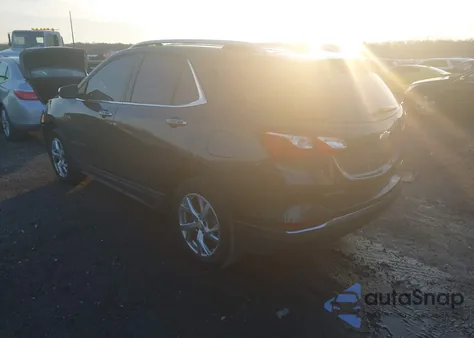 2018 Chevrolet Equinox Premier z USA, uszkodzony, nr VIN 2GNAXVEV9J6320399